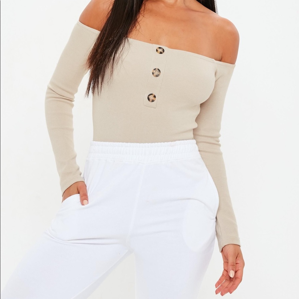 Off the shoulder cream button body suit